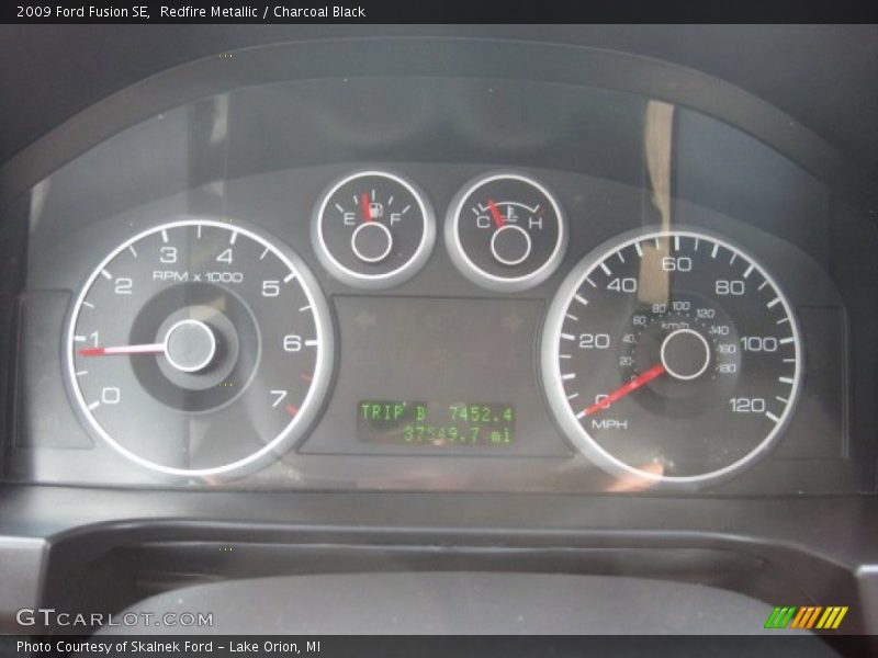 Redfire Metallic / Charcoal Black 2009 Ford Fusion SE