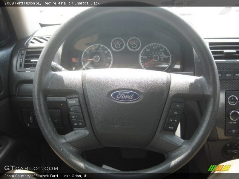 Redfire Metallic / Charcoal Black 2009 Ford Fusion SE