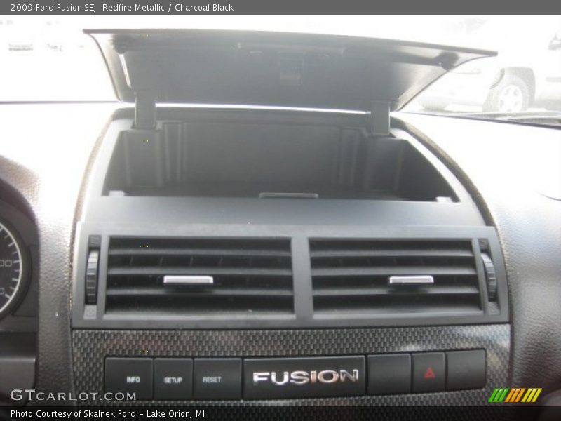 Redfire Metallic / Charcoal Black 2009 Ford Fusion SE