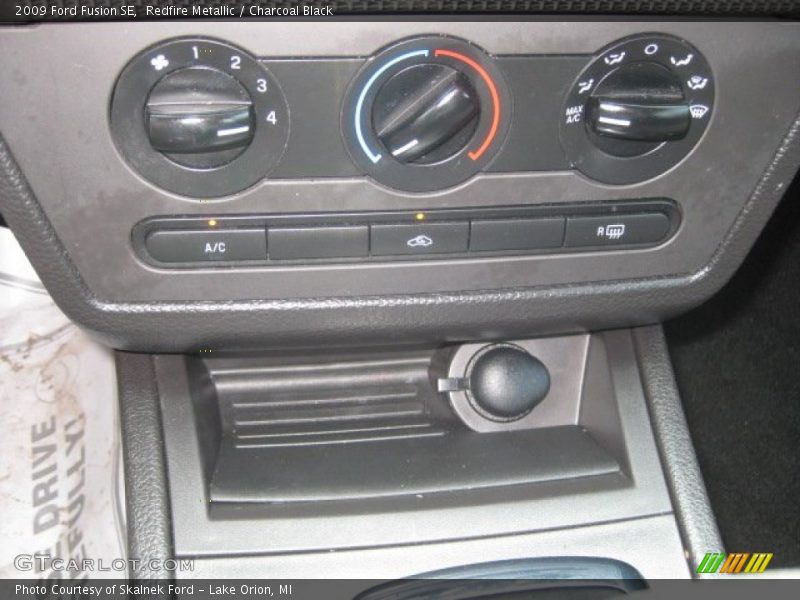 Redfire Metallic / Charcoal Black 2009 Ford Fusion SE