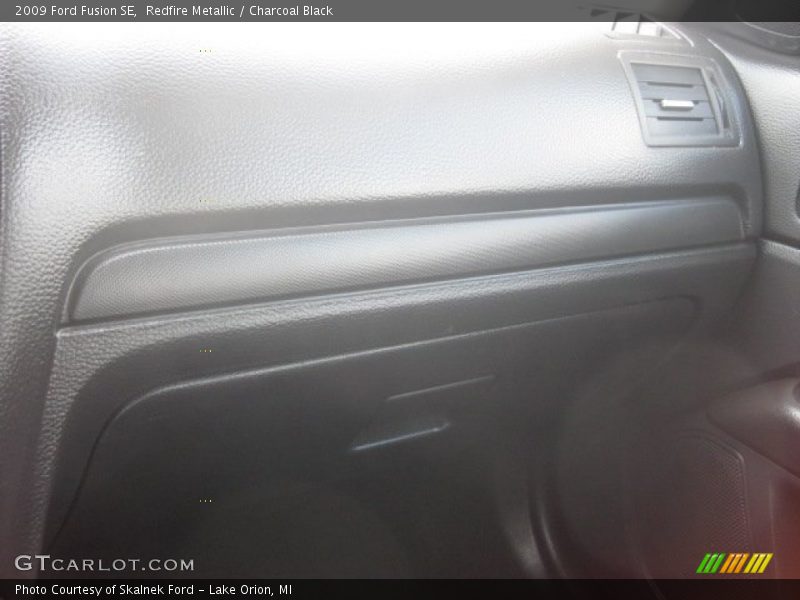 Redfire Metallic / Charcoal Black 2009 Ford Fusion SE