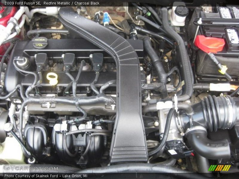Redfire Metallic / Charcoal Black 2009 Ford Fusion SE