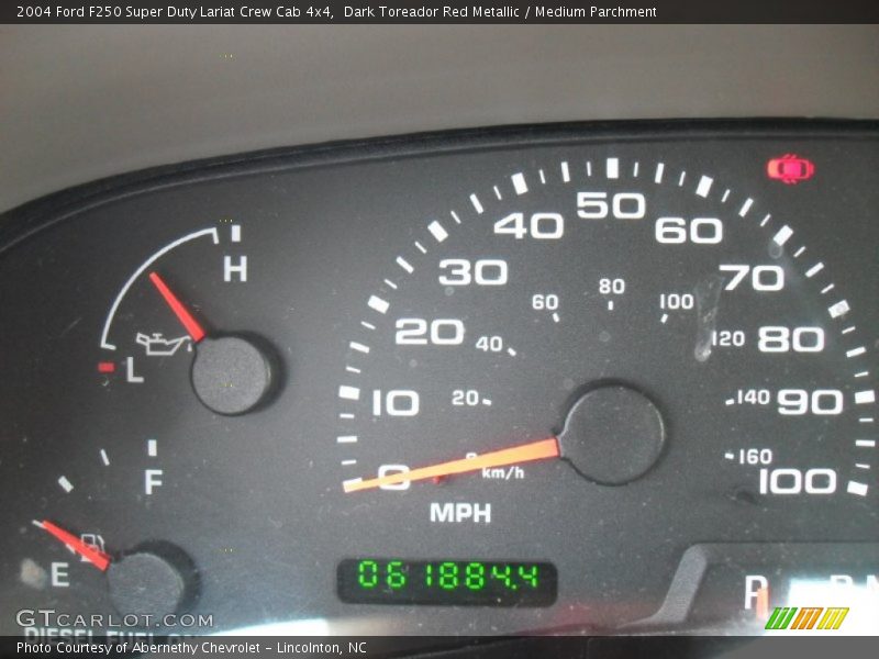 Dark Toreador Red Metallic / Medium Parchment 2004 Ford F250 Super Duty Lariat Crew Cab 4x4