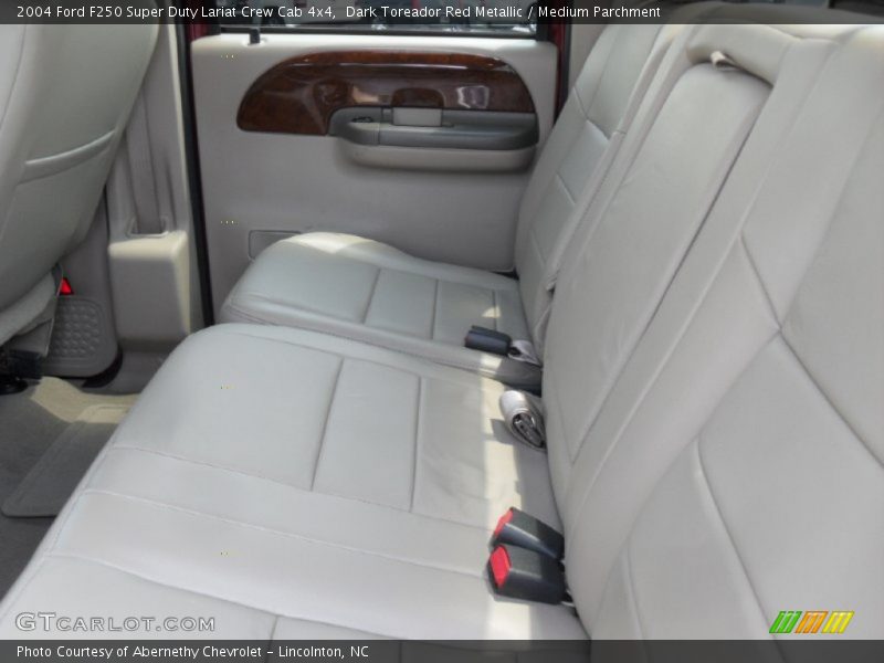 Dark Toreador Red Metallic / Medium Parchment 2004 Ford F250 Super Duty Lariat Crew Cab 4x4