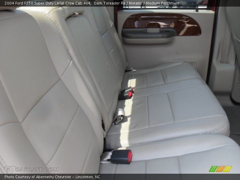 Dark Toreador Red Metallic / Medium Parchment 2004 Ford F250 Super Duty Lariat Crew Cab 4x4