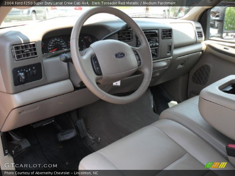 Dark Toreador Red Metallic / Medium Parchment 2004 Ford F250 Super Duty Lariat Crew Cab 4x4