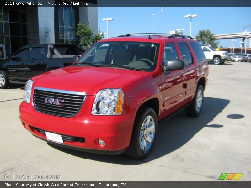 Victory Red / Light Tan 2011 GMC Yukon SLT