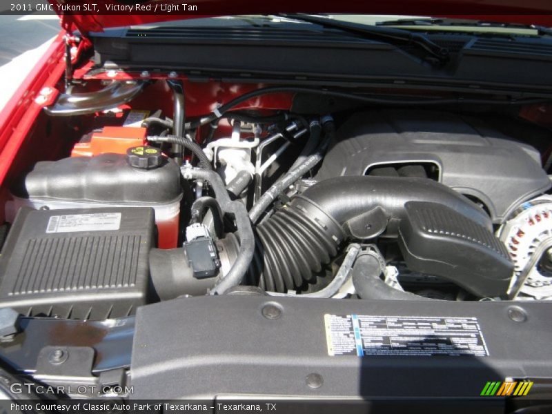 Victory Red / Light Tan 2011 GMC Yukon SLT