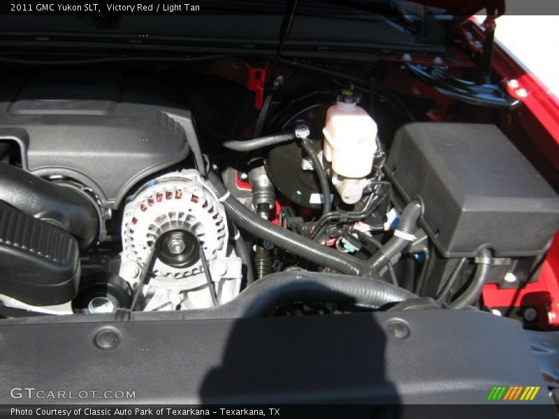 Victory Red / Light Tan 2011 GMC Yukon SLT