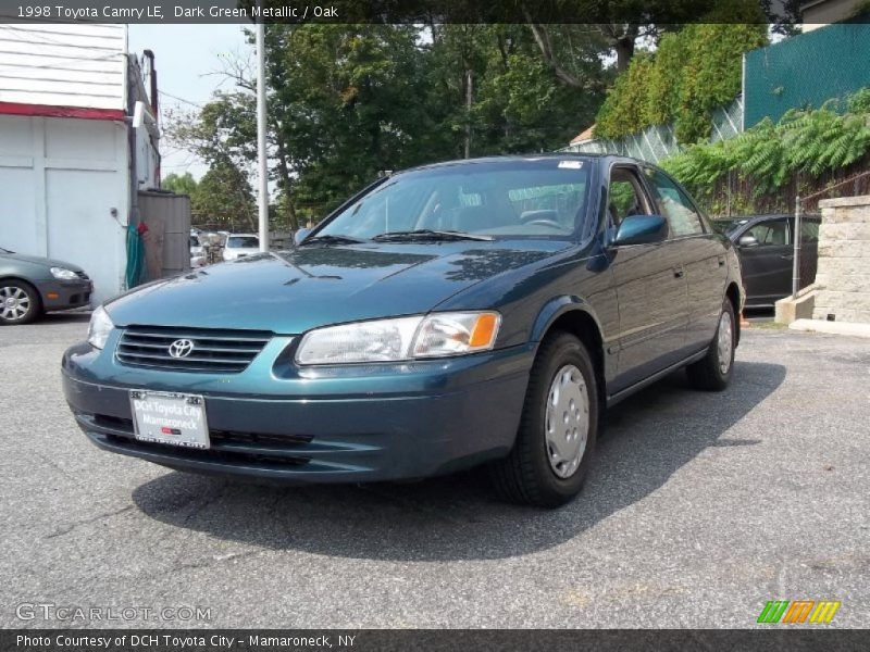 Dark Green Metallic / Oak 1998 Toyota Camry LE