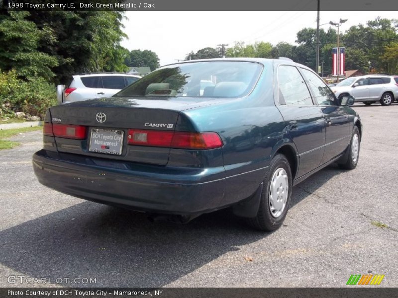Dark Green Metallic / Oak 1998 Toyota Camry LE