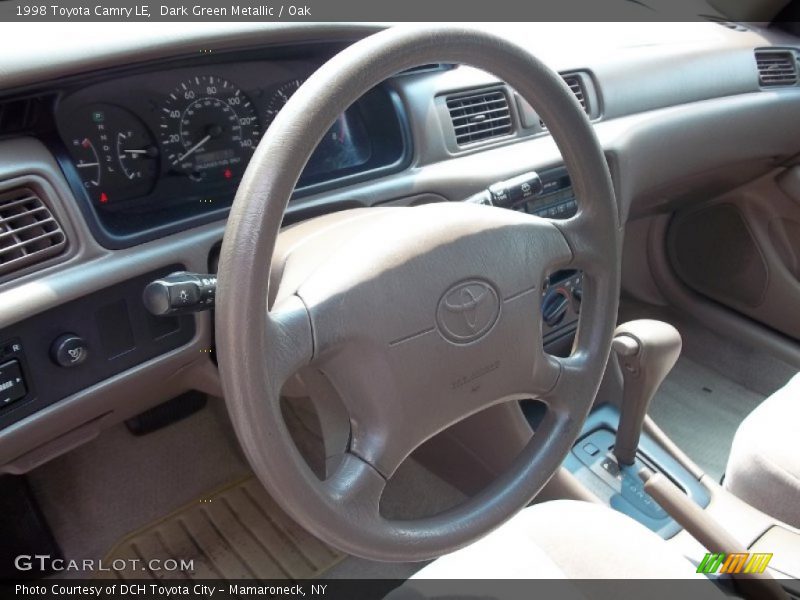 Dark Green Metallic / Oak 1998 Toyota Camry LE