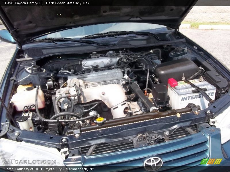 Dark Green Metallic / Oak 1998 Toyota Camry LE