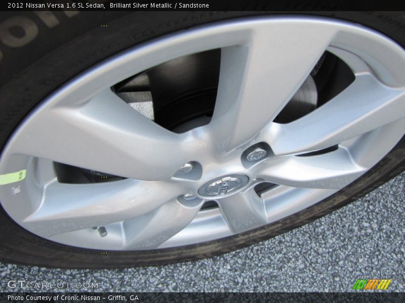 Brilliant Silver Metallic / Sandstone 2012 Nissan Versa 1.6 SL Sedan