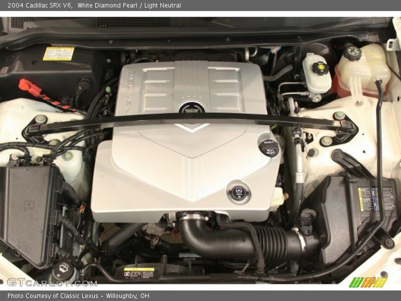 White Diamond Pearl / Light Neutral 2004 Cadillac SRX V6