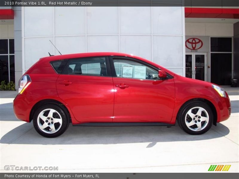 Red Hot Metallic / Ebony 2010 Pontiac Vibe 1.8L