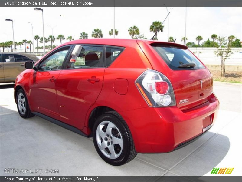 Red Hot Metallic / Ebony 2010 Pontiac Vibe 1.8L