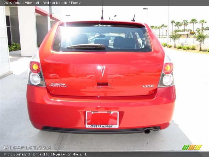 Red Hot Metallic / Ebony 2010 Pontiac Vibe 1.8L