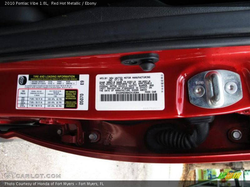 Red Hot Metallic / Ebony 2010 Pontiac Vibe 1.8L