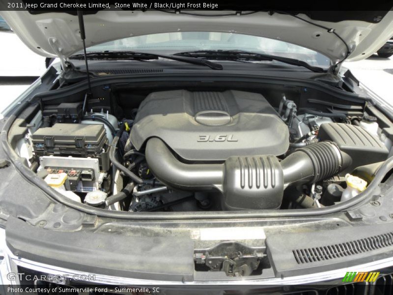 Stone White / Black/Light Frost Beige 2011 Jeep Grand Cherokee Limited