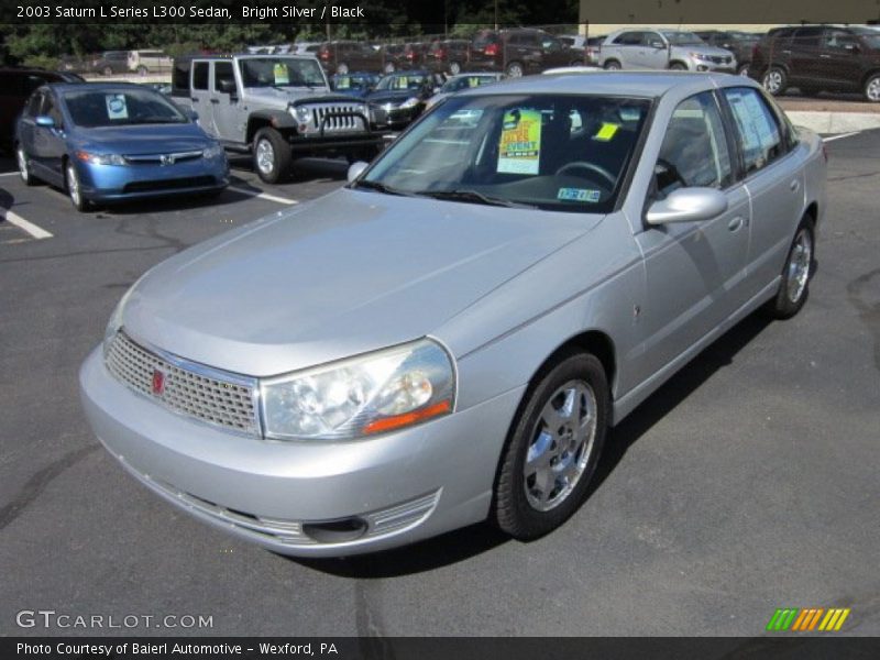Bright Silver / Black 2003 Saturn L Series L300 Sedan