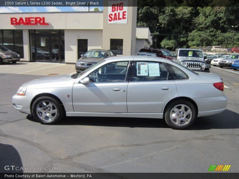 Bright Silver / Black 2003 Saturn L Series L300 Sedan