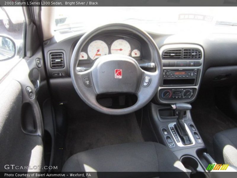 Bright Silver / Black 2003 Saturn L Series L300 Sedan