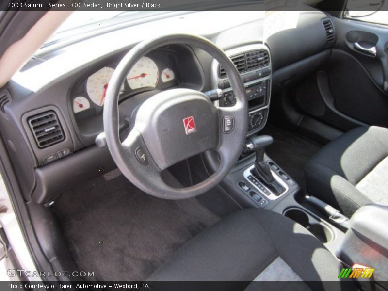 Bright Silver / Black 2003 Saturn L Series L300 Sedan