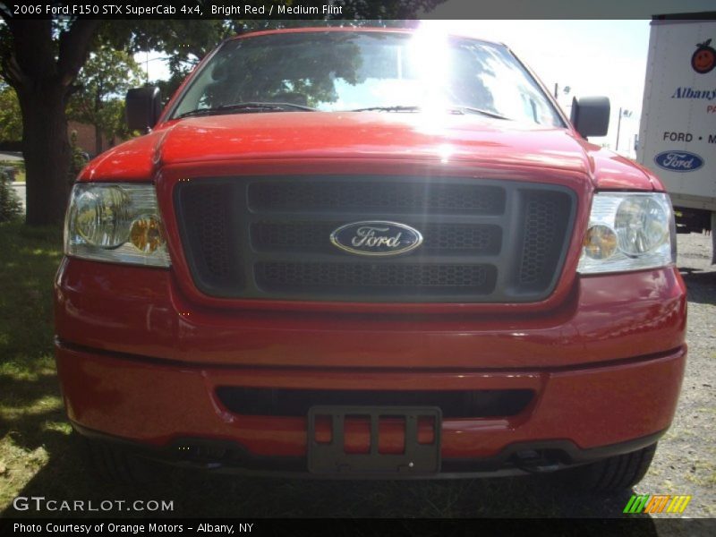 Bright Red / Medium Flint 2006 Ford F150 STX SuperCab 4x4