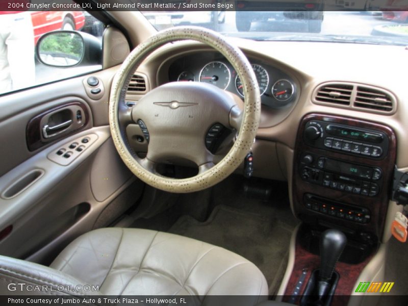Light Almond Pearl Metallic / Sand Stone Beige 2004 Chrysler Concorde LXi