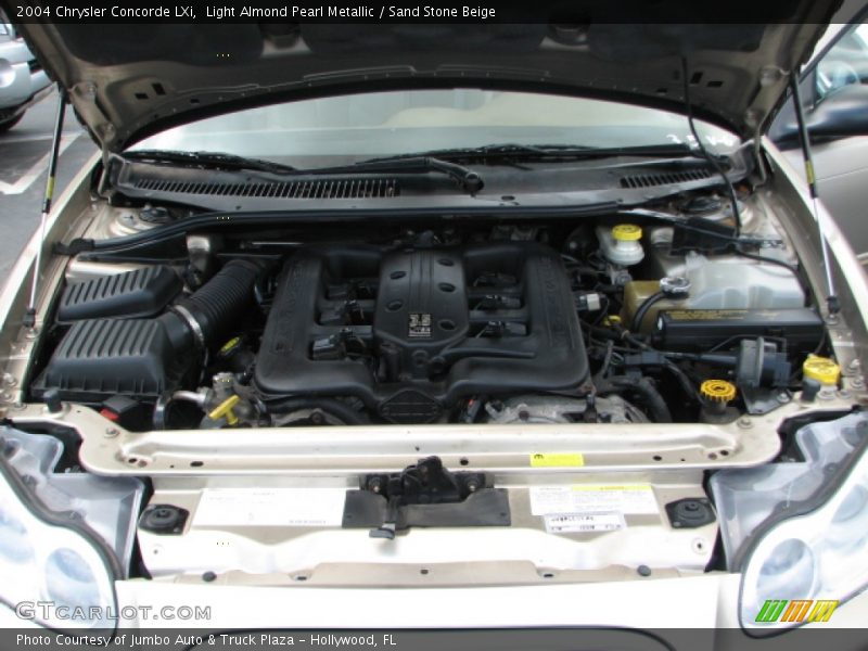 Light Almond Pearl Metallic / Sand Stone Beige 2004 Chrysler Concorde LXi