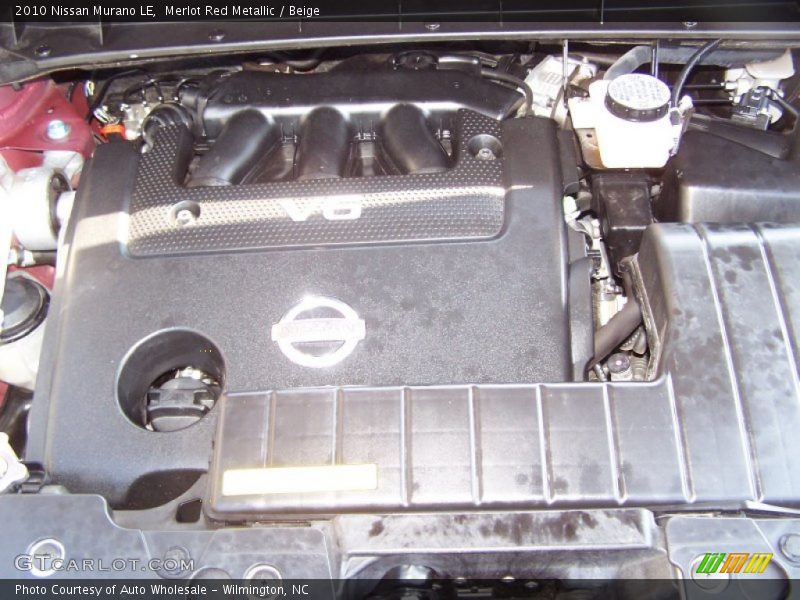 Merlot Red Metallic / Beige 2010 Nissan Murano LE