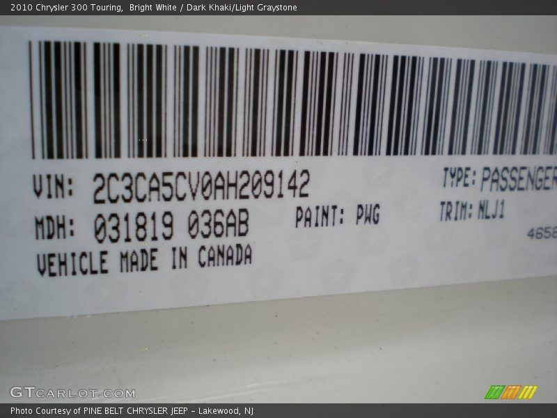 Bright White / Dark Khaki/Light Graystone 2010 Chrysler 300 Touring