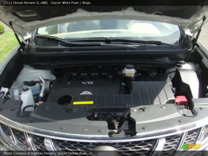 Glacier White Pearl / Beige 2011 Nissan Murano SL AWD
