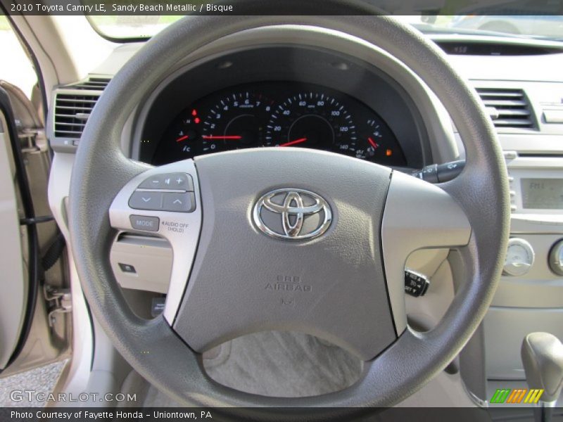 Sandy Beach Metallic / Bisque 2010 Toyota Camry LE