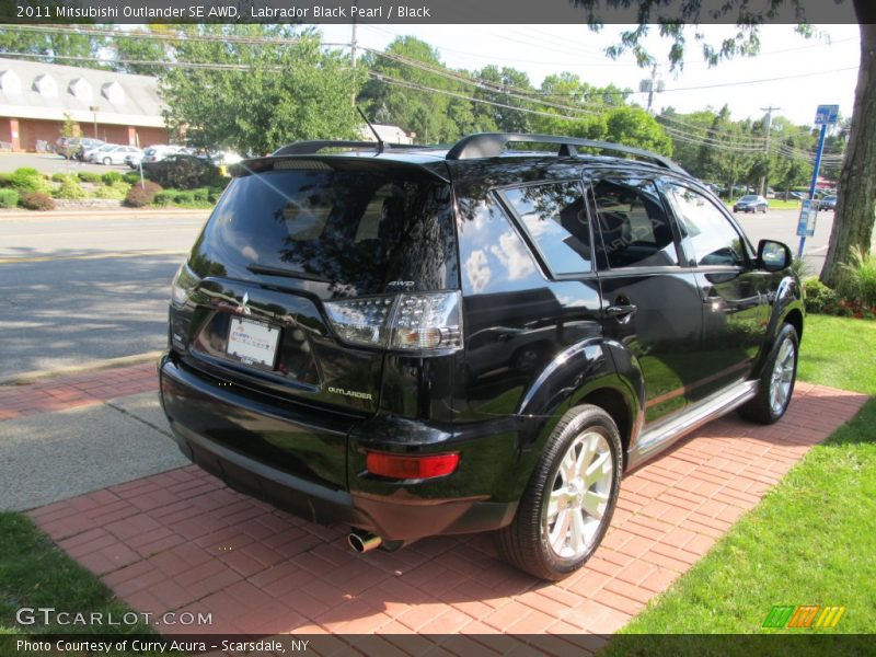 Labrador Black Pearl / Black 2011 Mitsubishi Outlander SE AWD