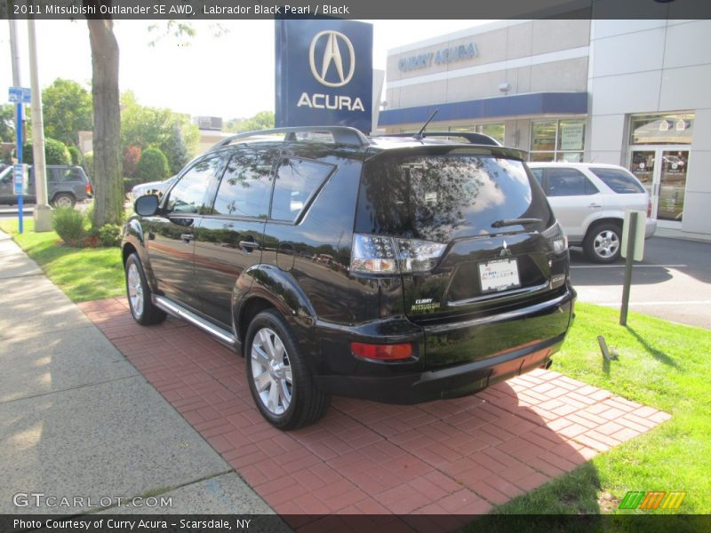 Labrador Black Pearl / Black 2011 Mitsubishi Outlander SE AWD