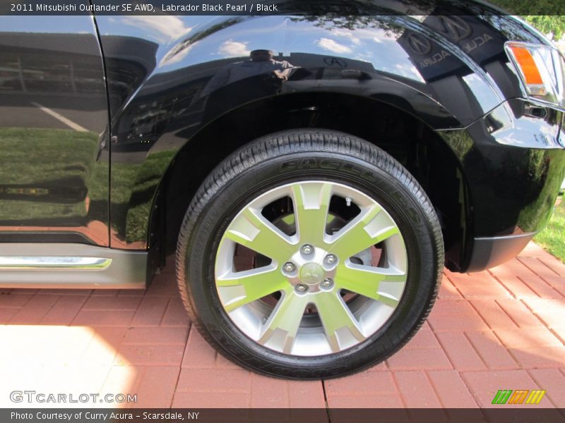 Labrador Black Pearl / Black 2011 Mitsubishi Outlander SE AWD
