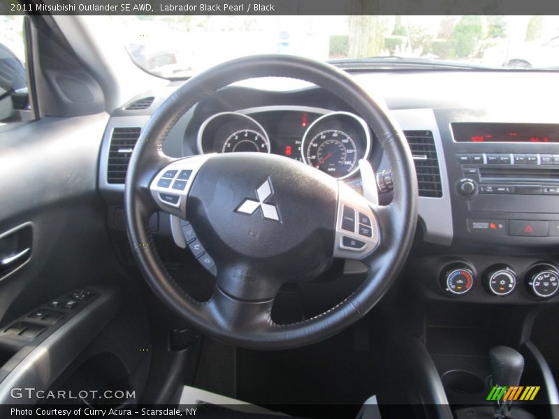 Labrador Black Pearl / Black 2011 Mitsubishi Outlander SE AWD