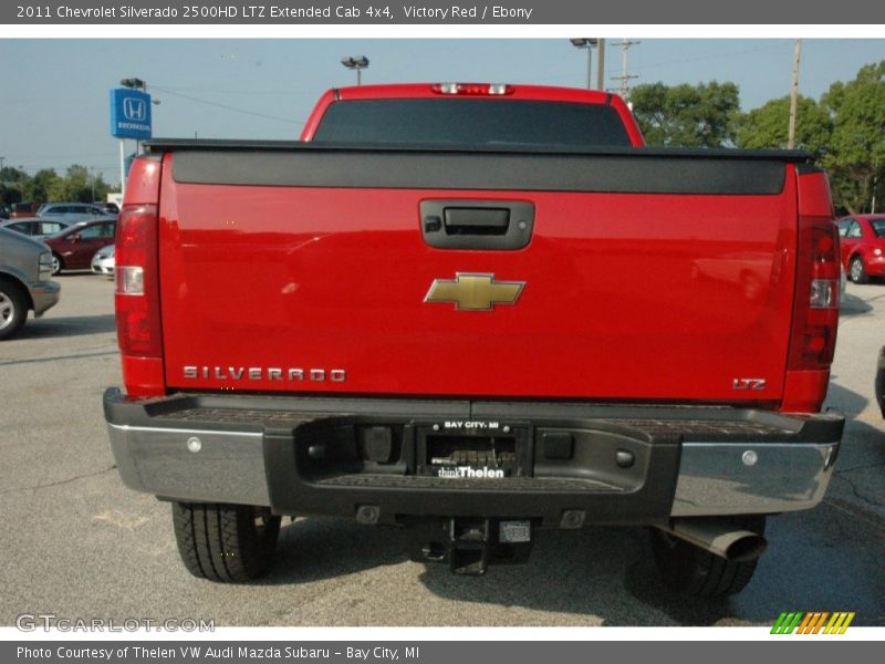 Victory Red / Ebony 2011 Chevrolet Silverado 2500HD LTZ Extended Cab 4x4