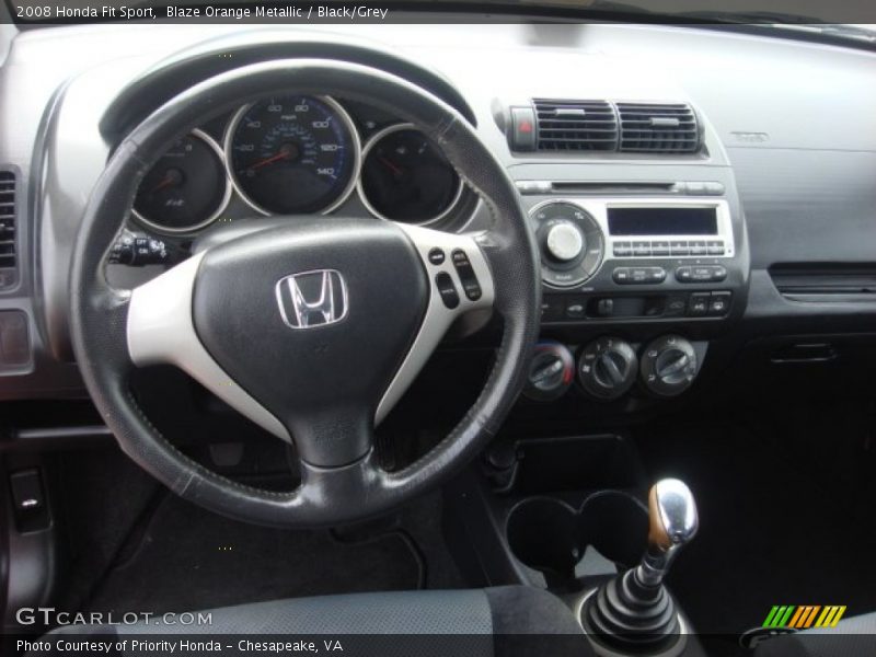 Blaze Orange Metallic / Black/Grey 2008 Honda Fit Sport