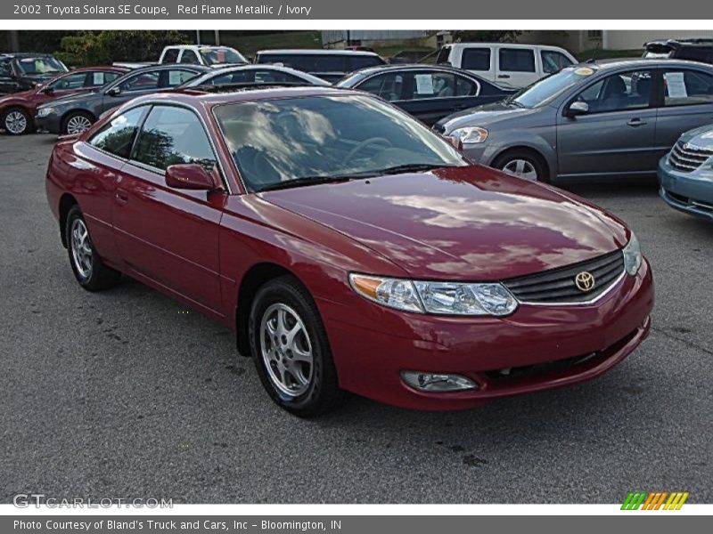 Red Flame Metallic / Ivory 2002 Toyota Solara SE Coupe