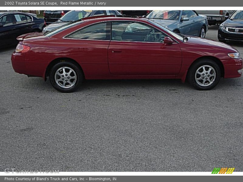 Red Flame Metallic / Ivory 2002 Toyota Solara SE Coupe