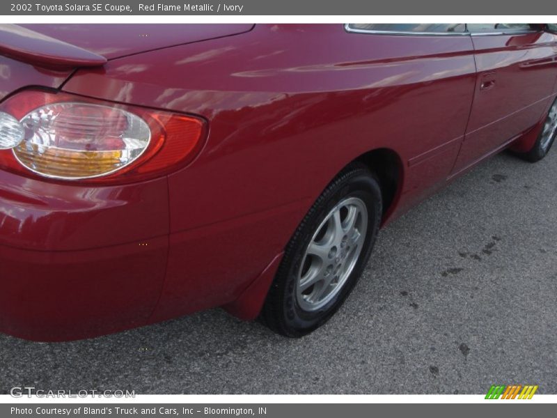 Red Flame Metallic / Ivory 2002 Toyota Solara SE Coupe
