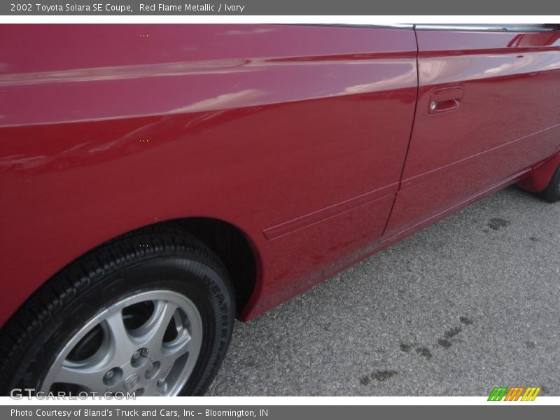 Red Flame Metallic / Ivory 2002 Toyota Solara SE Coupe
