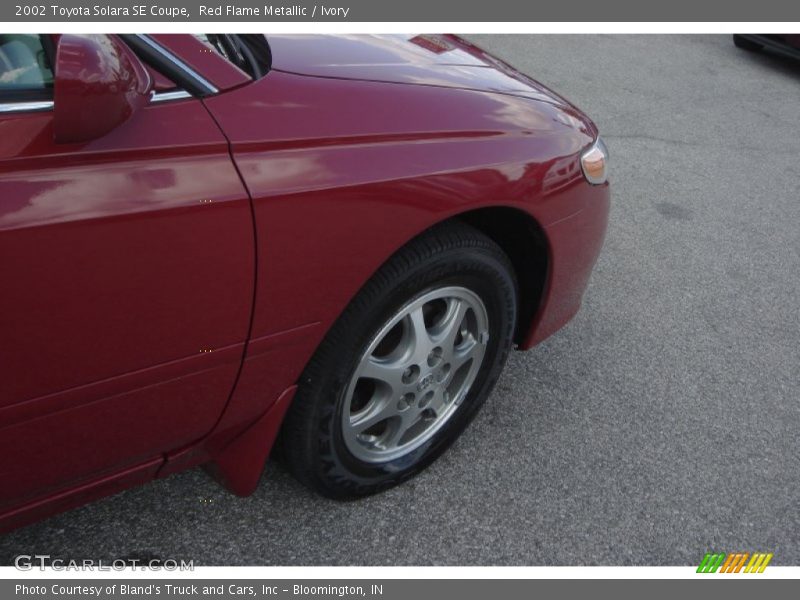 Red Flame Metallic / Ivory 2002 Toyota Solara SE Coupe