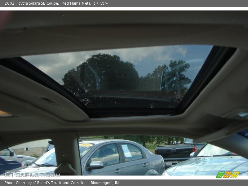 Red Flame Metallic / Ivory 2002 Toyota Solara SE Coupe