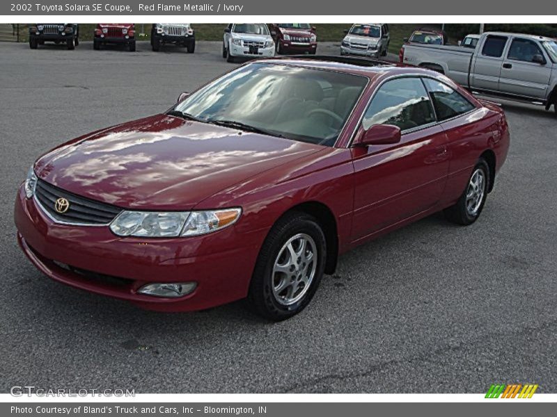 Red Flame Metallic / Ivory 2002 Toyota Solara SE Coupe