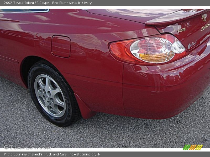 Red Flame Metallic / Ivory 2002 Toyota Solara SE Coupe