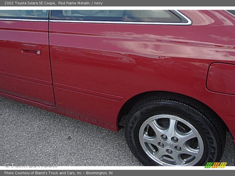 Red Flame Metallic / Ivory 2002 Toyota Solara SE Coupe